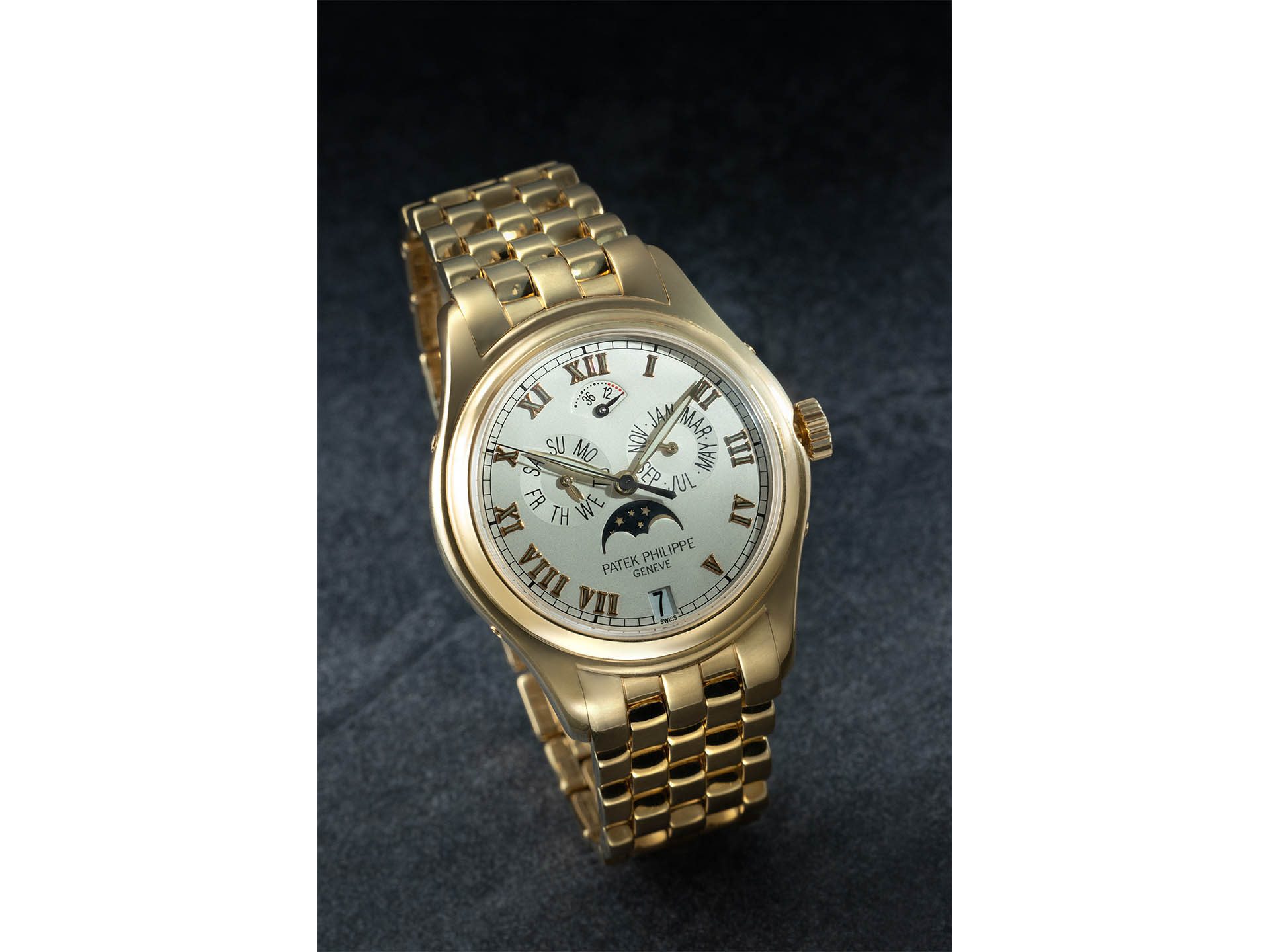 Patek Philippe, 18k Yellow Gold Ref. 5036/1j-001 Annual Calendar With Moon Phase Wristwatch. 